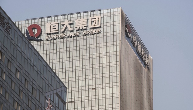 The China Evergrande headquarters in Shenzhen. The clock is ticking for the worldu2019s most indebted developer, whose liquidity woes sparked a broader debt crisis in Chinau2019s property industry thatu2019s gone on to engulf more home builders, threaten banks and pose growing challenges for President Xi Jinping.
