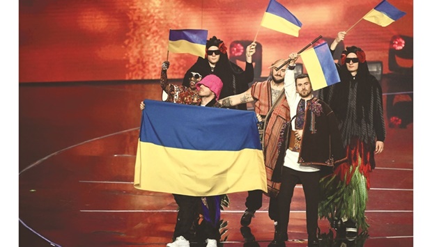 This picture taken on May 14 shows members of the band u2018Kalush Orchestrau2019: Oleh Psiuk, Tymofii Muzychuk, Ihor Didenchuk, Vitalii Duzhyk, Oleksandr Slobodianyk and Vlad Kurochka, representing Ukraine, arriving onstage during the final of the Eurovision Song Contest 2022 at the Pala Alpitour venue in Turin.