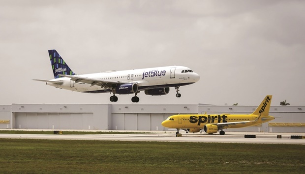 JetBlue and Spirit airplanes at Fort Lauderdale-Hollywood International Airport in Florida. The $3.8bn merger must undergo a rigorous antitrust review that analysts say could lead to significant divestitures or changes to the dealu2019s structure u2014 if it gets approved at all.