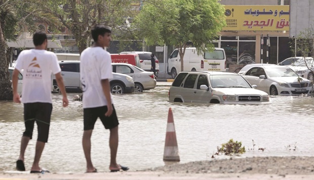 A flooded street is pictured in the UAEu2019s Fujairah emirate following heavy rainfall, yesterday.