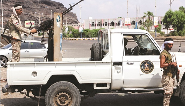 File photo shows members of the separatist Southern Transitional Council (STC) man a checkpoint in Aden, Yemen.