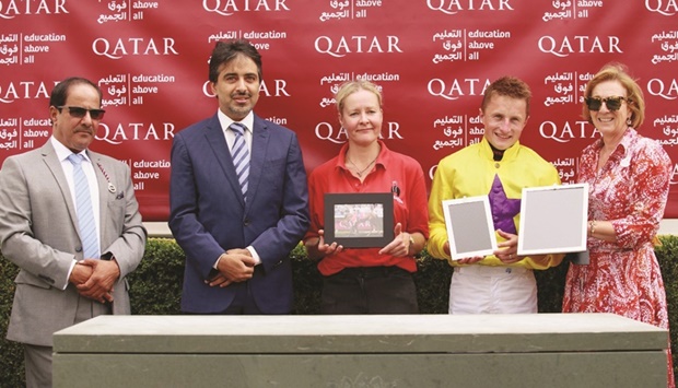 The CEO of Education Above All Fahad bin Hamad al-Sulaiti (second left) crowned the winners of the Qatar Lilly Langtry Stakes at the Qatar Good Festival yesterday. PICTURES: Zuzanna Lupa