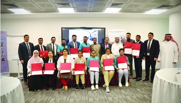 Some of the medical staff of Naseem Al Rabeeh Medical Centre who graduated from Qatar Charity's 'Lughati' programme.