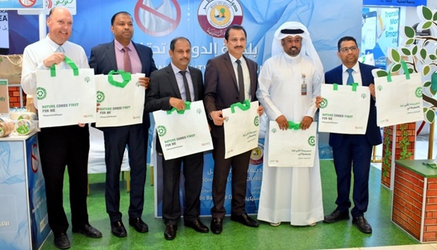 Officials from LuLu and Doha Municipality celebrating u2018International Plastic Bag Free Dayu2019 at the D-Ring Road branch. PICTURES: Thajudheen