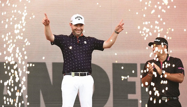Branden Grace of South Africa acknowledges the crowd as he is introduced as the champion of the LIV Golf Invitational - Portland at Pumpkin Ridge Golf Club in North Plains, Oregon. (AFP)