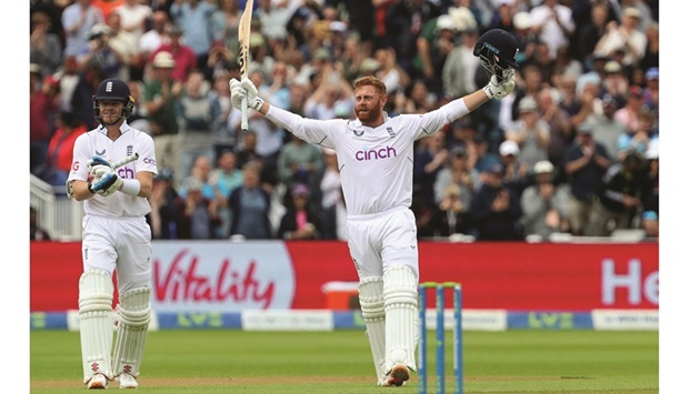 Englandu2019s Jonny Bairstow celebrates after reaching his century during play on Day 3 of the fifth Test against India at Edgbaston, Birmingham, in central England, yesterday. (Reuters)
