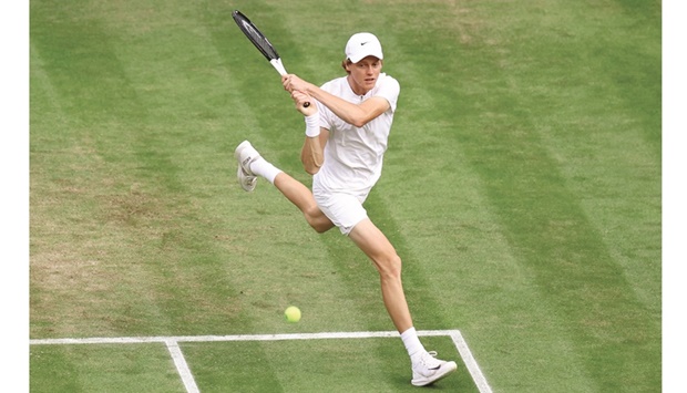 Italyu2019s Jannik Sinner in action during his fourth round match against Spainu2019s Carlos Alcaraz yesterday. (Reuters)