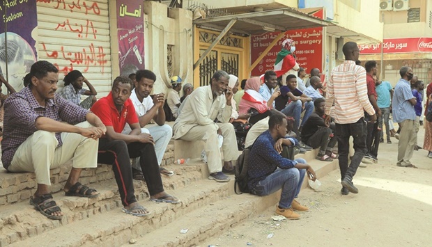 Protesters gather during a sit-in outside the Al-Jawda hospital in the capital Khartoum, yesterday.