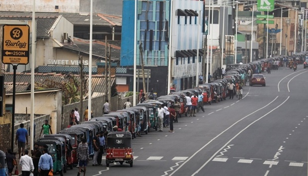 Three-wheelers queue to buy petrol due to fuel shortage, amid the country's economic crisis, in Colombo, Sri Lanka. REUTERS