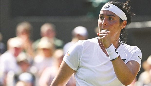 Tunisiau2019s Ons Jabeur celebrates winning against Germanyu2019s Tatjana Maria in their Wimbledon semi-final in London yesterday. (AFP)