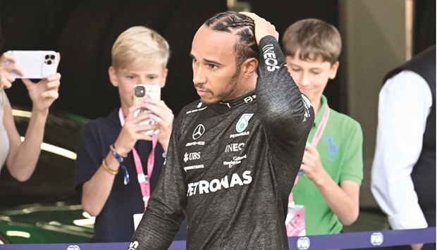 Mercedesu2019 British driver Lewis Hamilton walks back to the pits after crashing during the qualifying session of the Red Bull Ring Race Track in Spielberg ahead of Austrian GP to be held tomorrow. (AFP)