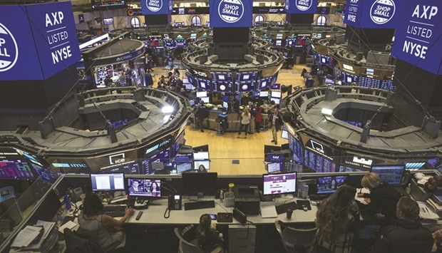 Traders work on the floor of the New York Stock Exchange. With a miserable first half for the stock market now in the history books, investors are assessing whether the US economy can avoid a significant downturn as the Federal Reserve raises rates to fight the worst inflation in decades.