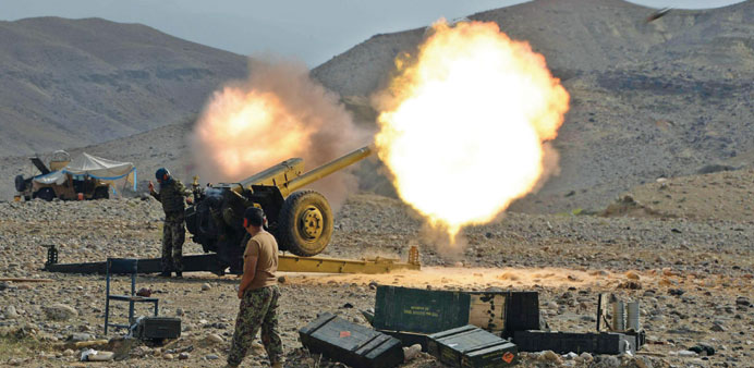 An artillery shell is fired during ongoing clashes between Afghan security forces and militants in Kot district of Nangarhar province.