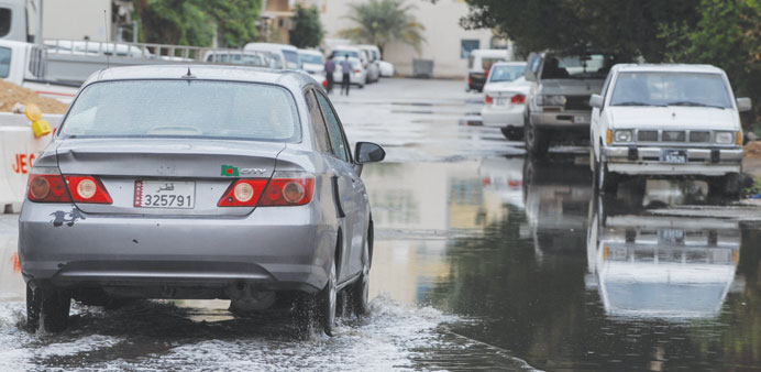 A waterlogged street in Doha after the rain on Sunday. PICTURE: Noushad Thekkayil