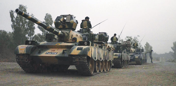 Pakistan army tanks form a column during a ground military operation against Taliban militants in the main town of Miranshah in North Waziristan. BELO
