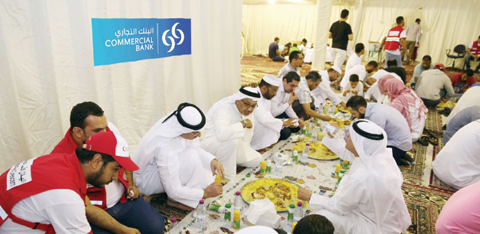  Officials join expatriate workers at the Iftar.