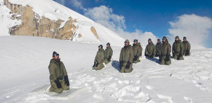 Soldiers perform yoga at the Siachen glacier.