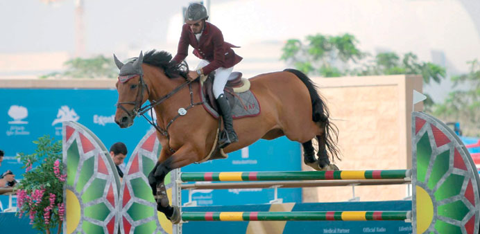 Qataru2019s Abdulrahman al-Saaq Marri rides Siec Cosmos to finish second in the CSI 3* Small Tour at the CHI Al SHAQAB in Doha yesterday. 
