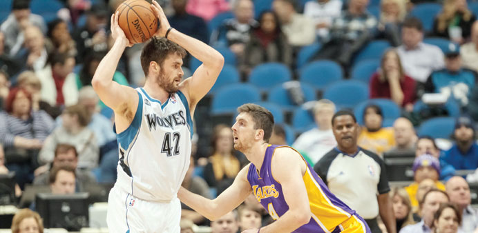 Minnesota Timberwolvesu2019 Kevin Love (left) in the first quarter against the Los Angeles Lakers. (USA Today Sports)