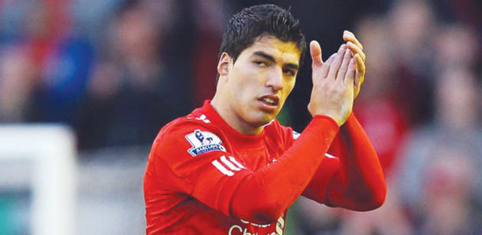 Luis Suarez: has cautioned Uruguay against complacency