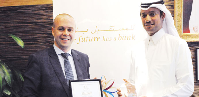 Khaled al- Subei receiving the award for The First Investor.