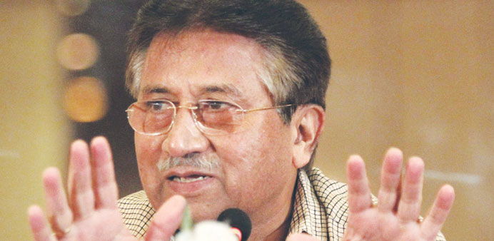 Pervez Musharraf gestures during a press conference in Karachi yesterday.
