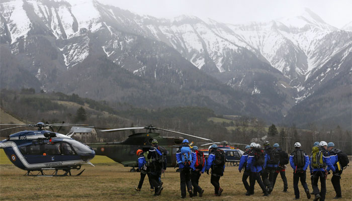  French police and gendarmerie Alpine rescue units gather as they prepare to reach the crash site, near Seyne, in the French Alps.