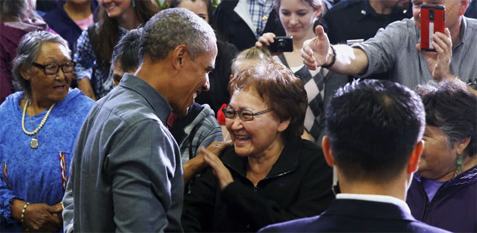 US President Barack Obama greets people after his remarks on climate change in Kotzebue, Alaska