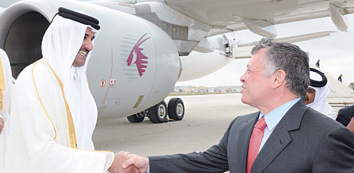 HH the Emir Sheikh Tamim bin Hamad al-Thani being welcomed upon arrival in Amman by King Abdullah of Jordan.