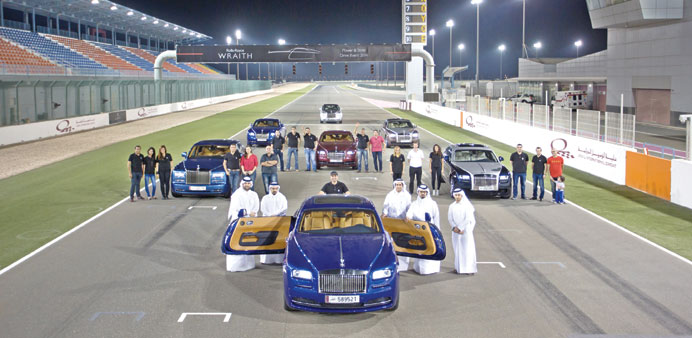 Rolls-Royce customers and staff at the drive event in Losail.