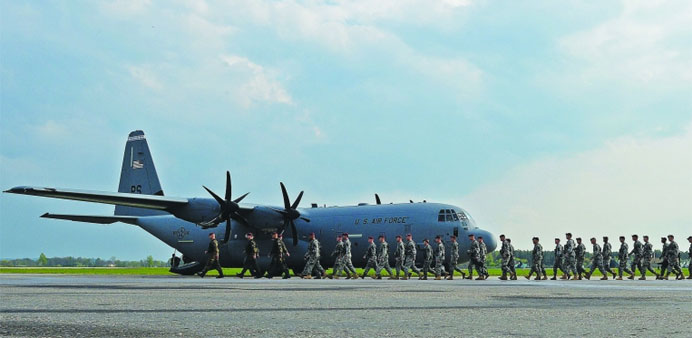 The first American troops arrive at the airport in Swidwin yesterday.