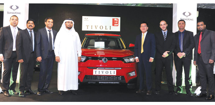 Officials of El Naeel Company and SsangYong flank the all-new SUV Tivoli. PICTURE: Jayan Orma