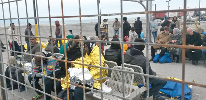 A temporary holding area for migrants who have just arrived on the Greek island of Kos which lacks any migrant reception facilities and is struggling 