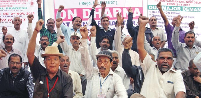 Former paramilitary personnel stage a demonstration demanding u2018one rank one pensionu2019 at Jantar Mantar in New Delhi yesterday.