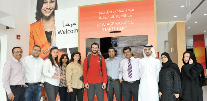 Colleagues at Mashreq Qatar during Mohamed Alaau2019s sendoff to Mt Elbrus.