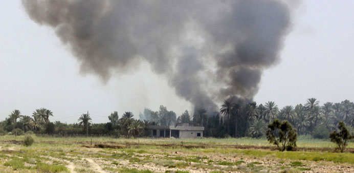 Smoke rising during clashes between Iraqi security forces and militants of the Islamic State, formerly known as the Islamic State in Iraq and the Leva
