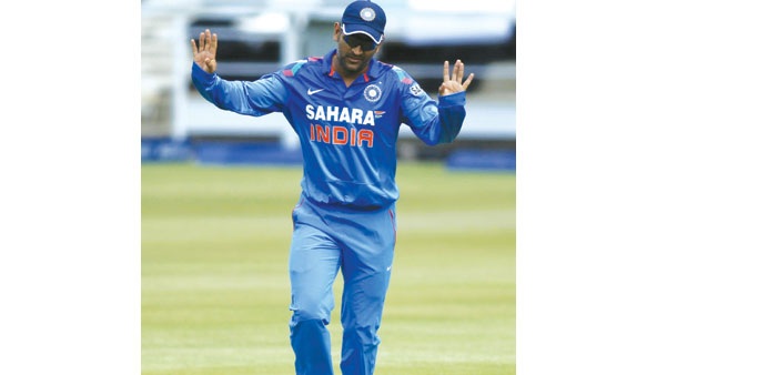 Indian captain MS Dhoni kicks a soccer ball during his teamu2019s training session ahead of todayu2019s first ODI against South Africa, in Johannesburg.