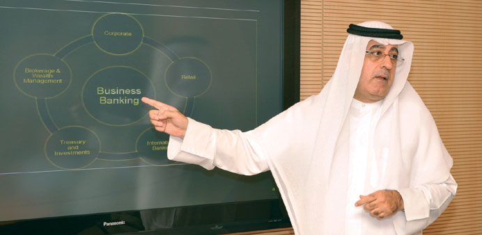 Murad elaborating on Ahli Banku2019s 2013 first-half results yesterday. The bank is not looking at mergers to grow in size, he said. Picture: Sami al-Thal