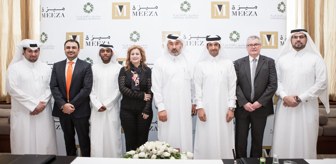 Msheireb Properties and Meeza officials at the signing ceremony.
