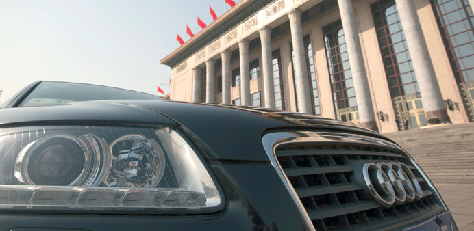 A Volkswagen Audi A6 is parked outside of the Great Hall of the People in Beijing (file). The German company aims to have the capacity to make over 4m