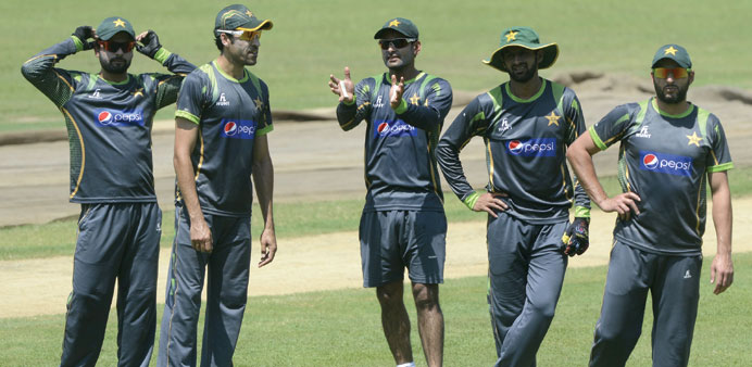 Pakistan captain Mohammad Hafeez (centre) and cricketers Umar Gul (left), Shahid Afridi (right) and Shoaib Malik attend a training session at The Sher