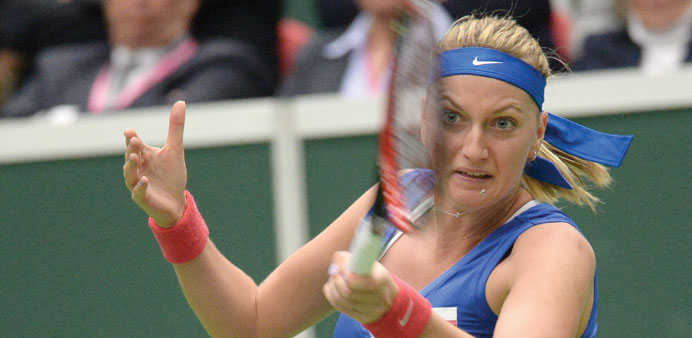 Petra Kvitova of Czech Republic returns a ball to Kristina Mladenovic of France during the Fed Cup semi-final in Ostrava yesterday. (AFP)