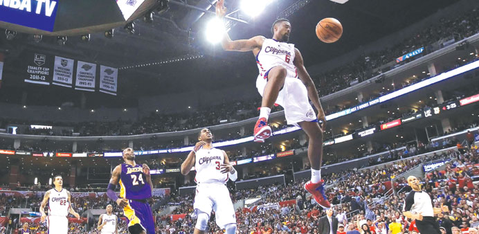 DeAndre Jordan of the Los Angeles Clippers slam dunks the ball against the LA Lakers, during their NBA game at Staples Center in Los Angeles on Sunday