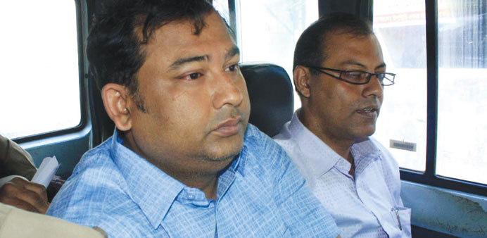 Panja is taken by police to be produced in a court in West Bengalu2019s North 24 Parganas yesterday.