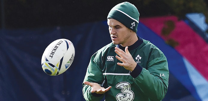 Irelandu2019s fly half Jonathan Sexton catches the ball during a team training session in Newport. (AFP)