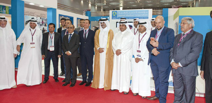 HMC officials with HE Abdullah bin Khalid al-Qahtani at the event yesterday.