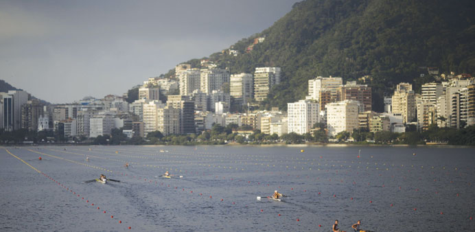Rowers practising at Rodrigo de Freitas Lagoon in Rio de Janeiro ahead of the 2016 Olympic Games.