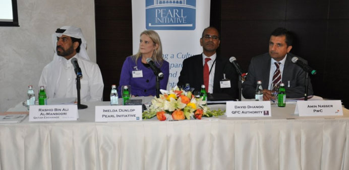 From left: Rashid bin Ali al-Mansoori, Dunlop, David Dhanoo and Amin Nasser, partner (Middle East),  Family Business Advisory Services Leader PwC, at 