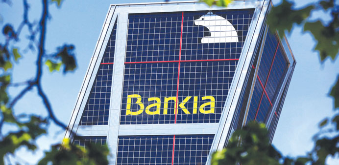   Bailed-out Bankia had last week announced it had swung to a u20ac200mn profit in the first half of 2013.