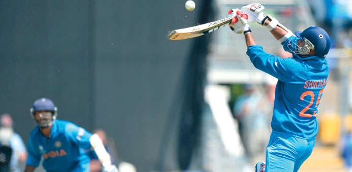 Indiau2019s Shikhar Dhawan plays an upper-cut during the opening Champions Trophy match against South Africa at the Cardiff Wales Stadium in Cardiff yeste